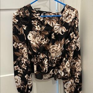 V-neck with cinched waist, black and brown top from Express. Like new condition.
